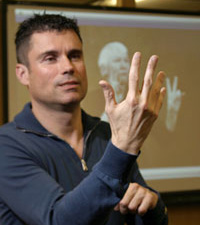 A sign language interpreter communicates a speaker's words