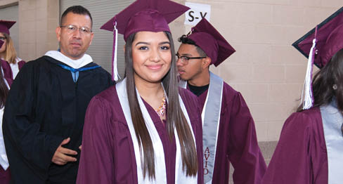 Smiling student graduating, Fort Worth ISD